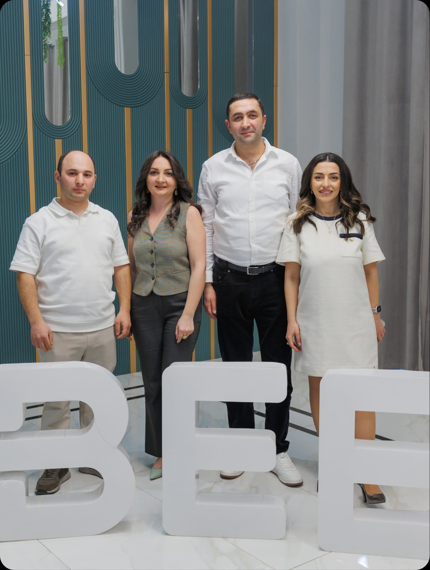 BeeWeb team members celebrating together
